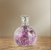 Sugar Plum Fragrance Lamp - A glittering handcrafted mosaic in glass fragments of bright pink and sugared lilac decorates the Sugar Plum Fragrance Lamp. Topped with a silver fretwork crown.

Beautiful, elegant and desirable – our Fragrance Lamps will fill your world with fragrance like nothing else. Utilising a catalytic combustion technique, our Fragrance Lamps actively purify, cleanse and perfume the air in the home, removing malodours and contaminants. Used in combination with any Ashleigh & Burwood Lamp Fragrance, you can scent and purify your air at the same time.